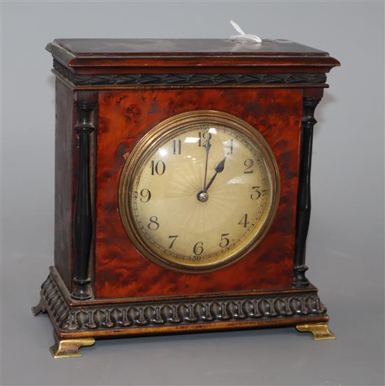 A French amboyna mantel timepiece height 17cm